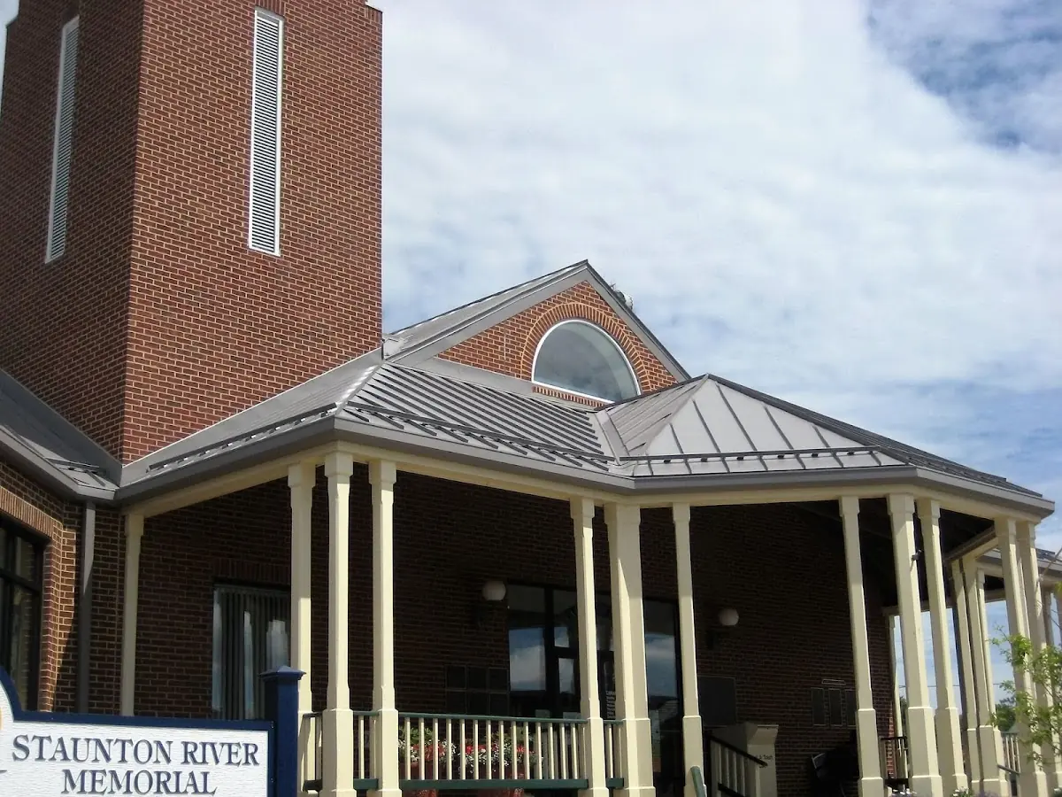 Skilled roofing craftsmen working on a residential roof in Rockleigh